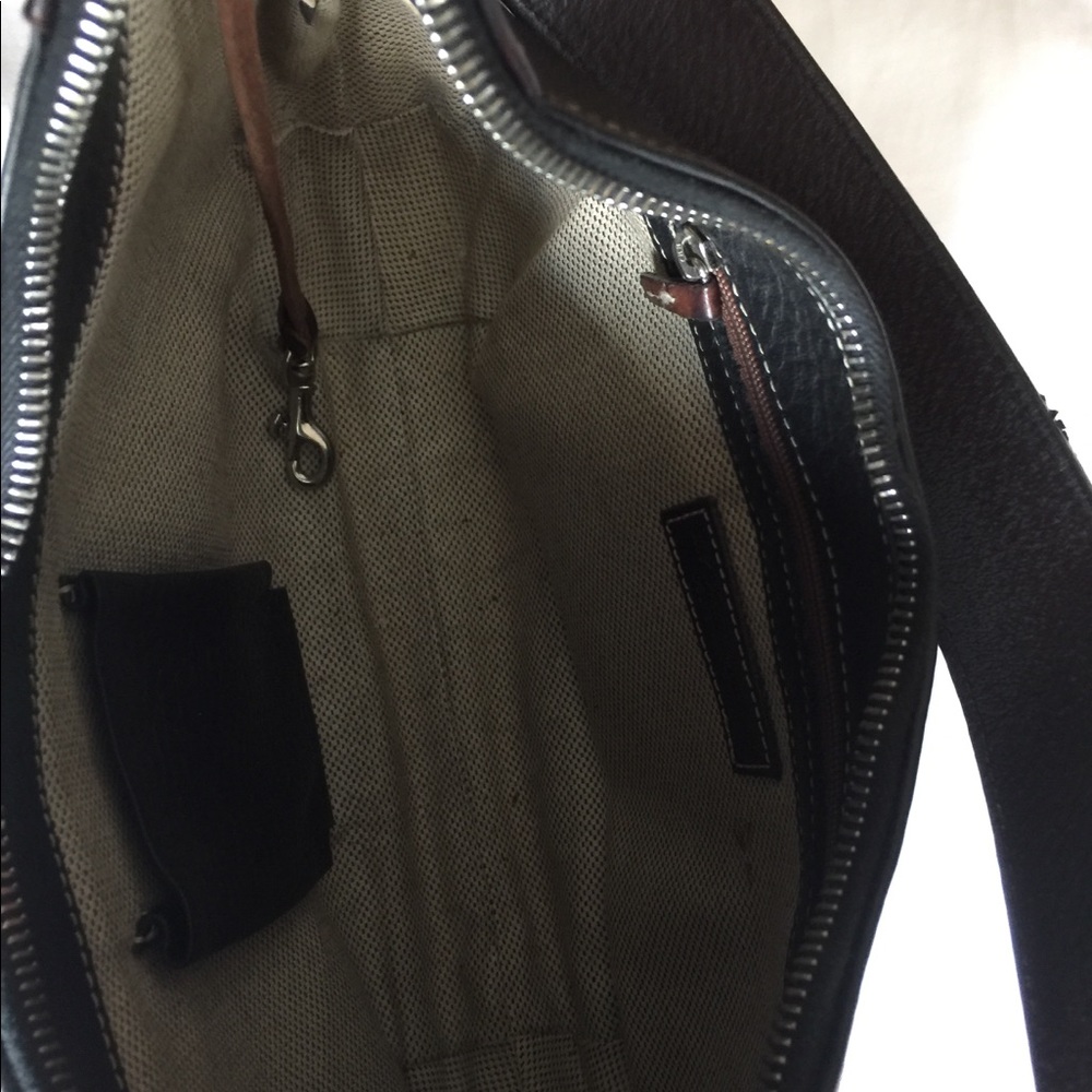 Leather bag with matching wallet by Dooney Bourke